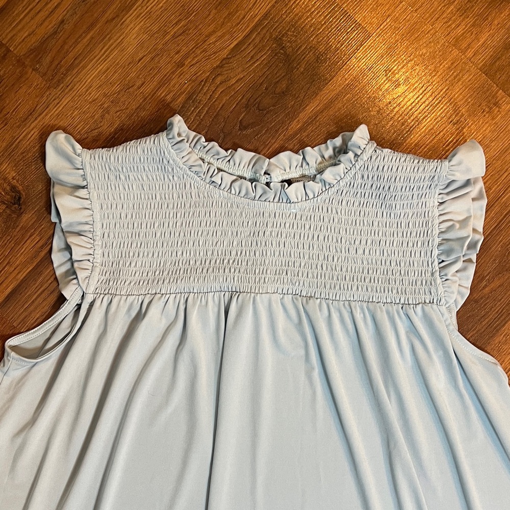 Sky Blue Ruffled Sleeveless Blouse - Picture 3 of 5